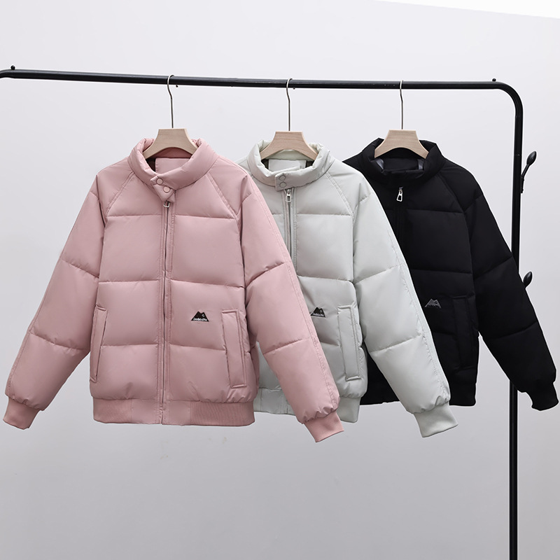 Nuevo estilo de invierno coreano suelto de cuello de pie ropa de pan pareja engrosada de algodón chaqueta de algodón chaqueta de moda para hombres y mujeres