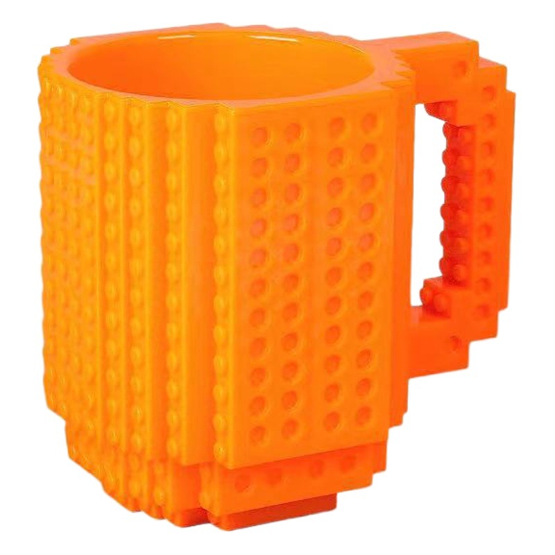 Fábrica al por mayor personalizado creativo Asamblea taza de agua educativa taza de té resistente a la gota taza de té Lego bloque de construcción