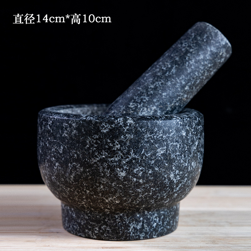 un cilindro de piedra negra tipo molino de piedra de grasa