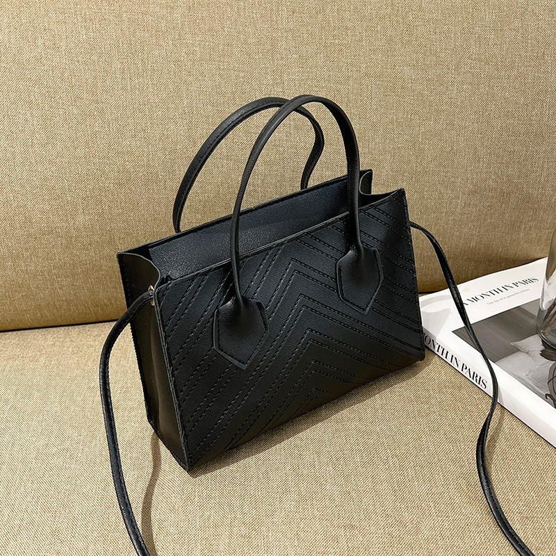 2023 nuevo estilo coreano de moda relieve V-patrón diamante bolso de hombro simple bolso de mano casual