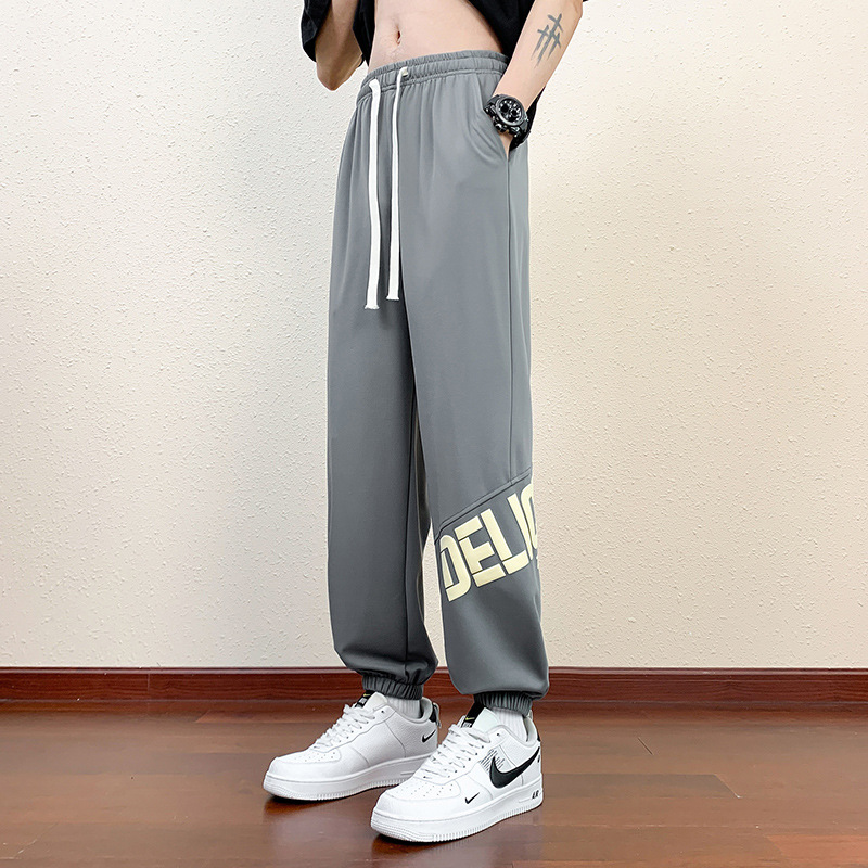 Pantalones cortos deportivos de hielo negro para hombres verano 2024 nueva marca de moda americana suelta rápida secado recto pantalones casuales de cinco puntos