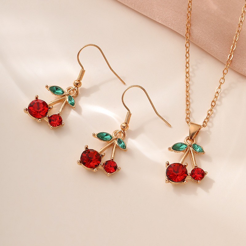 Ins viento rojo cereza clavícula aretes conjunto de joyería para mujeres transfronterizas colgante de cereza verde accesorios de aretes