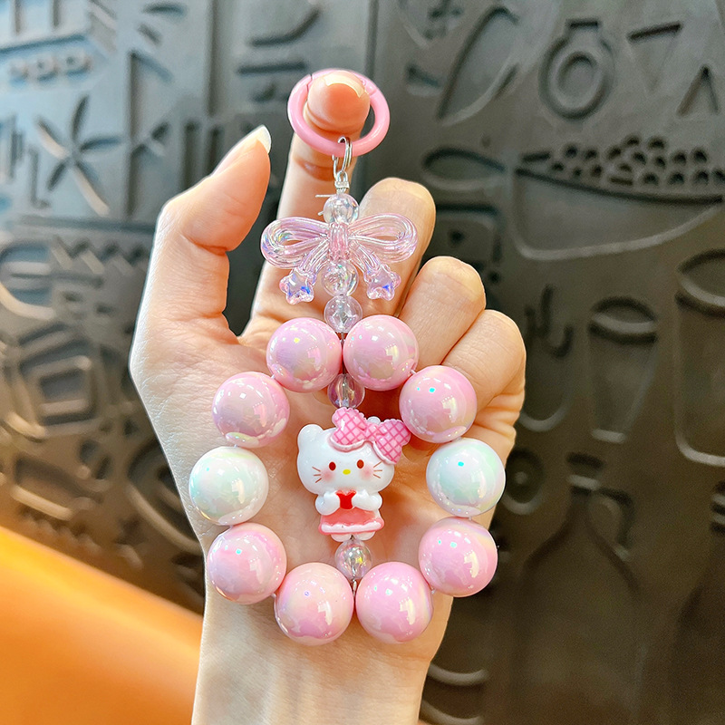 Creativa nueva muñeca pequeña cadena de teléfono móvil llavero colgante bolso lindo accesorios llavero de coche regalo al por mayor