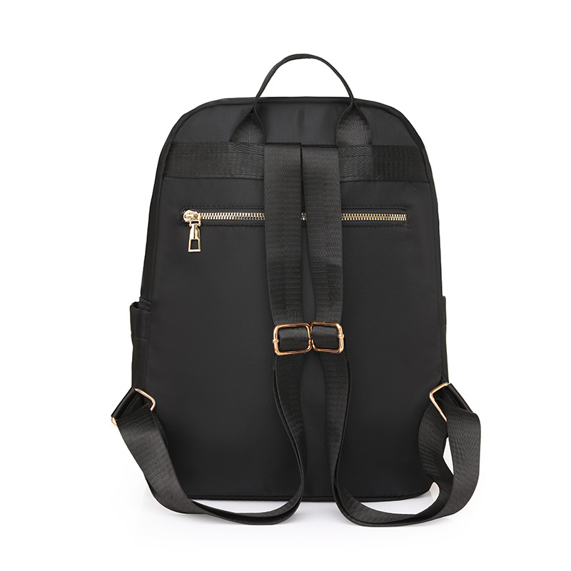 Fábrica al por mayor 2024 nueva mochila de nailon casual para mujer, mochila para madre y niño de viaje urbano de todo fósforo de moda