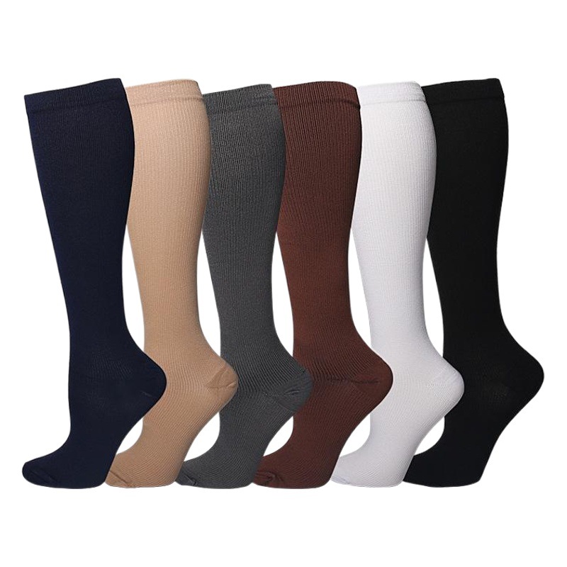 Calcetines de compresión deportivos de venta caliente transfronterizos Calcetines de energía muscular de color sólido Calcetines médicos Calcetines de compresión de cuerda de saltar para mujer Calcetines de pantorrilla para correr Calcetines