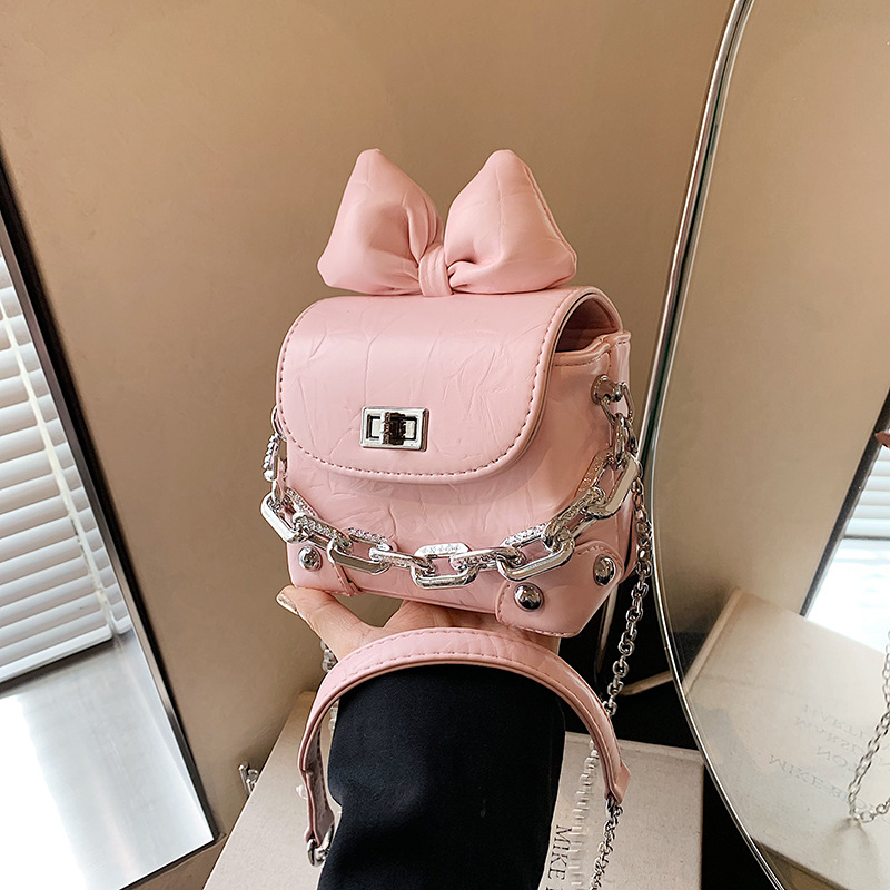 Bolso de mochila este año popular mini bolso de mujer nuevo arco de color sólido cadena bolso de mano bolso de hombro