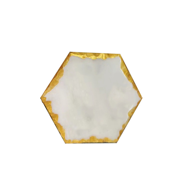 Posavasos hexagonal de mármol dorado 10*8,7 cm