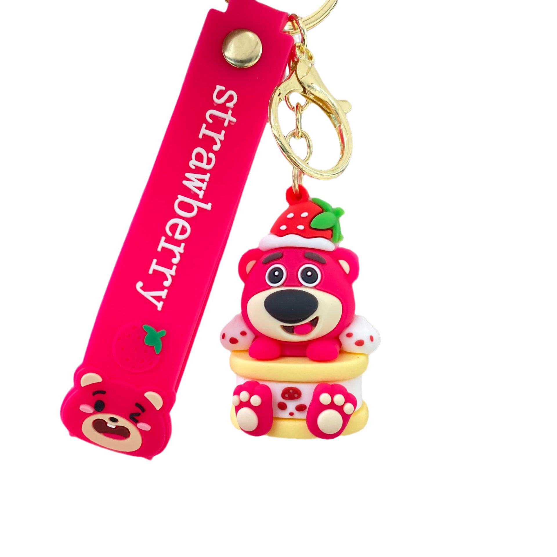 Nueva historieta en línea celebridad codicioso fresa oso llavero muñeca coche bolsa bebé captura máquina colgante llavero al por mayor