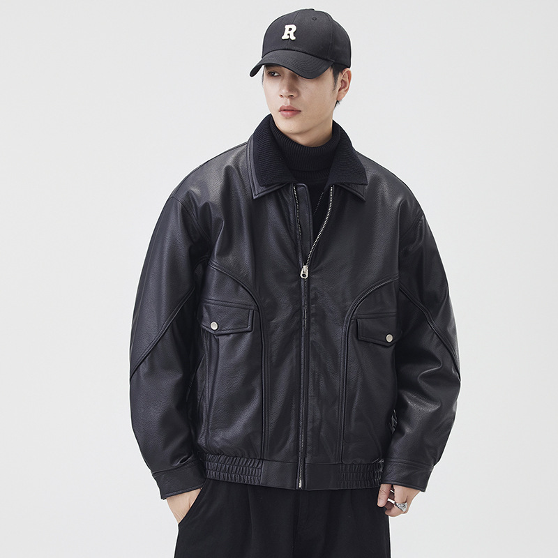 Falso de dos piezas de chaqueta de plumón con solapa de cuero PU para hombres 2025 invierno nuevo estilo casual suelto guapo chaqueta de diseño plumón