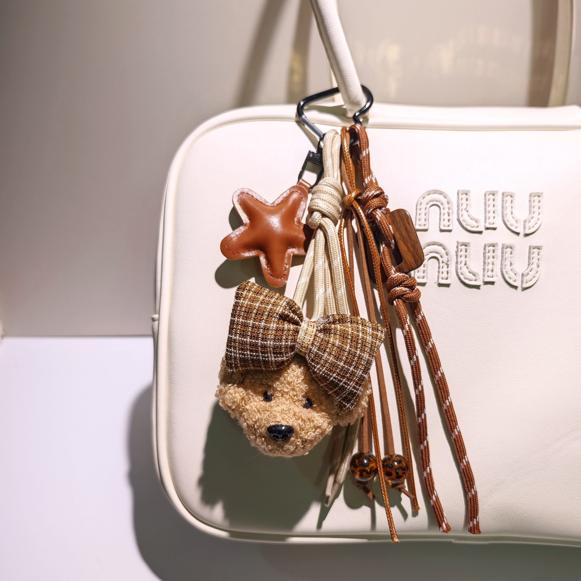 Patio de peluche perros arcos llaveros pu estrellas cuerdas trenzadas bolsos accesorios cadenas de teléfonos celulares