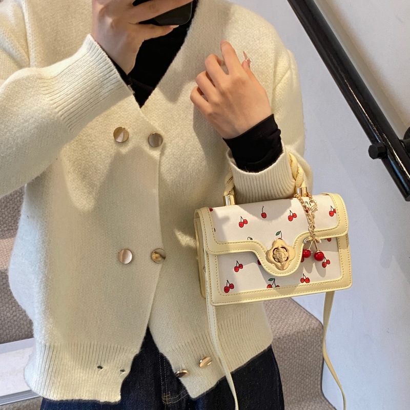 Bolso de moda coreano 2024 otoño e invierno nuevo bolso femenino lindo bolso de hombro de cereza estilo occidental color contraste bolso de mensajero marea