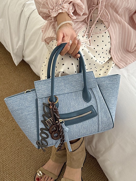 Bolso para mujeres 2026 comercio exterior nuevo bolso de mano de gran capacidad de alta calidad color contraste commuting cara sonriente bolso de mochila