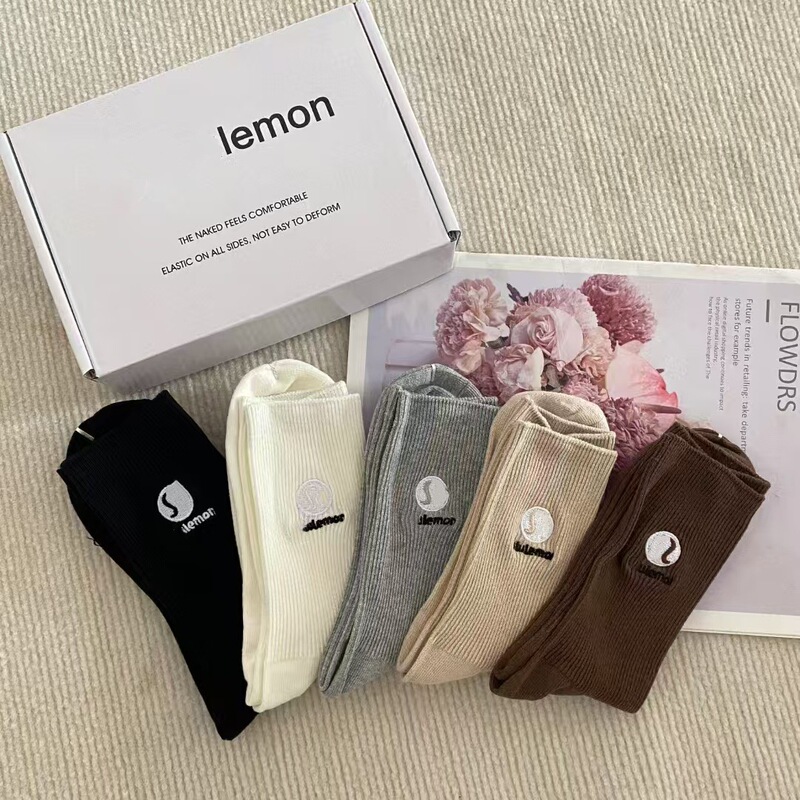 Foreign trade lulu yoga socks embroidery standard double needle high tube leisure sports socks Lulu solid color all-match pile socks Foreign trade lulu yoga socks embroidery standard double needle high tube leisure sports socks Lulu solid color all-match pile socks