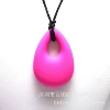 Red teether drop-shaped