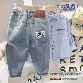男童裤子春秋款2025新款儿童春装牛仔裤中大童纯色字母帅气长裤潮