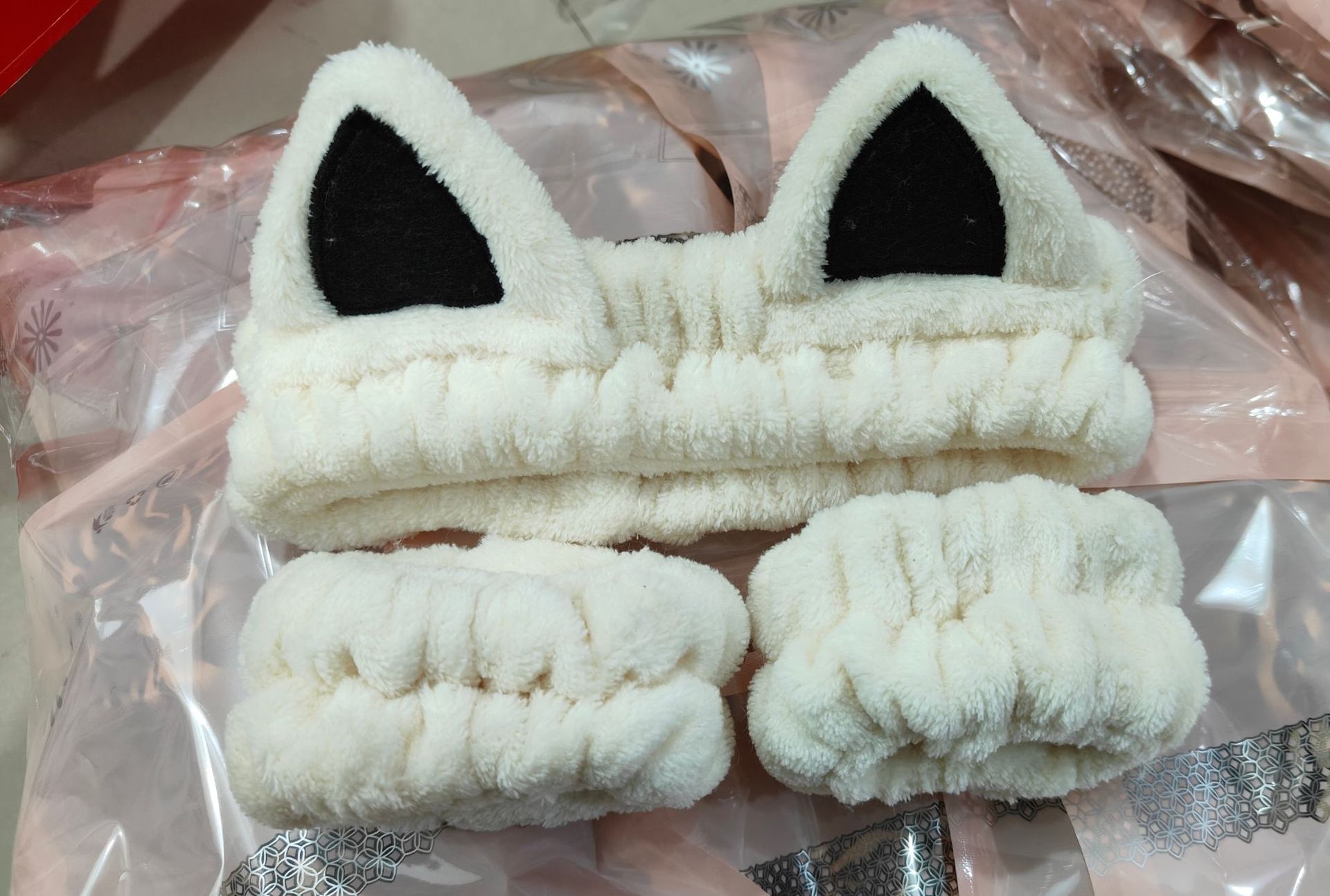 Otoño y invierno nuevo super lindos dibujos animados animal correa de cabello conjunto de correa de muñeca a prueba de humedad presión protector de cabello de muñeca lavado de la cara accesorios de cabello al por mayor