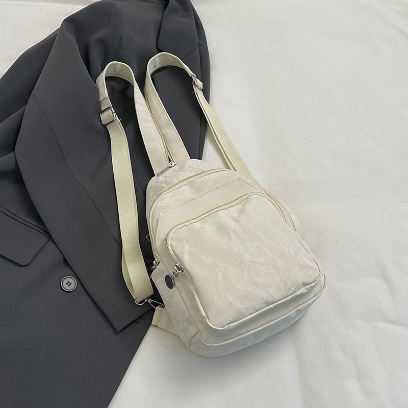 Nuevos productos de cuero suave pu doble uso bolso de pecho de moda de mujer impresión de tendencia nueva mochila china textura mochila pequeña