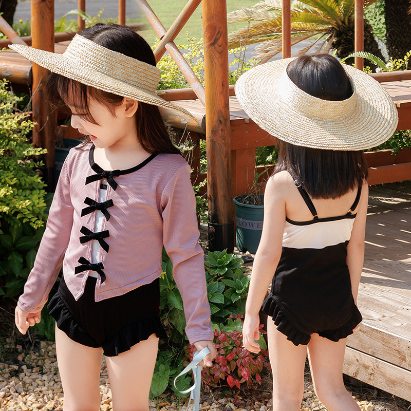 Trajes de baño para niños explosivo Zhongtong split set de dos piezas chicas de ballet de moda lindos arcos de mangas largas trajes de baño de protección solar