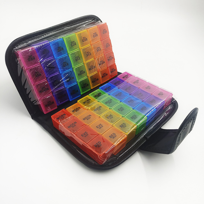 Amazon bolsa de cuero billetera caja de la píldora siete días de gran capacidad portátil caja de la píldora 56 rejilla de color caja de almacenamiento