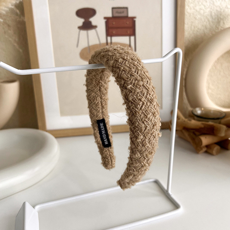 韓国の秋冬の編み物の高い頭の頂の広い辺のカチューシャの女性の外出の百合の髪の気質の毛のカチューシャの頭の飾り