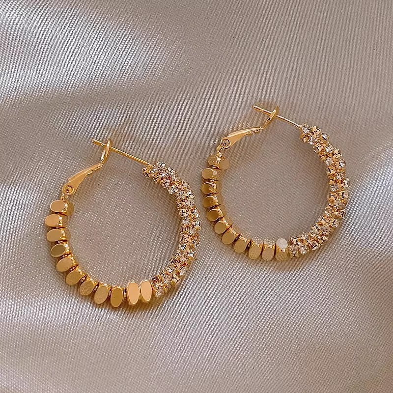 2025 nuevo estilo círculo de moda hebilla de oreja de plata rota cobre chapado en oro real pendientes elegantes de moda pendientes de lujo ligero de alta gama