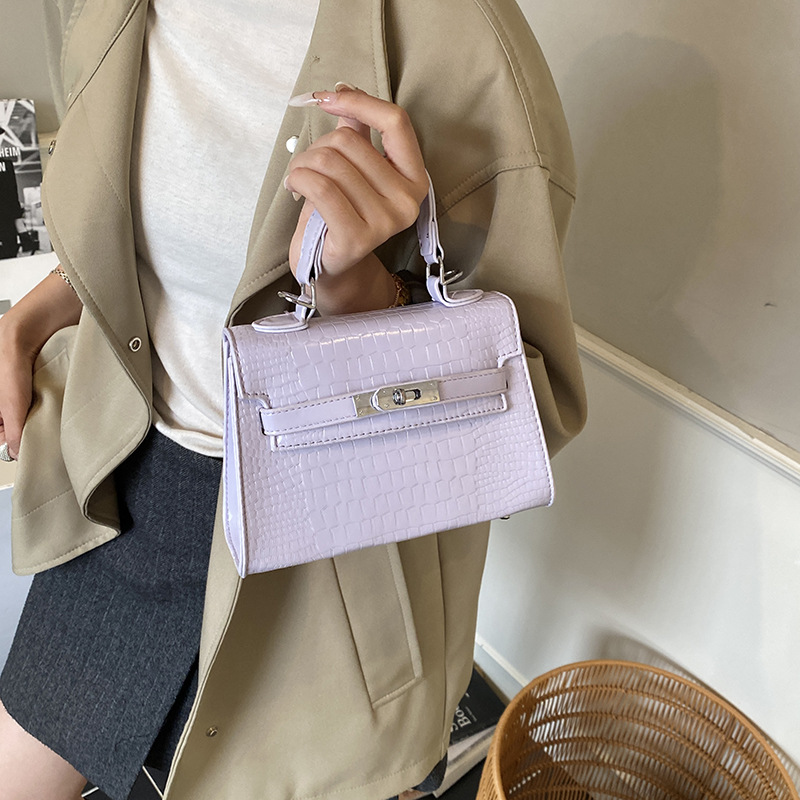 Bolsos de piedra de alta calidad para mujeres 2025, nuevos bolsos de moda portátiles de invierno versátiles mochila de viaje