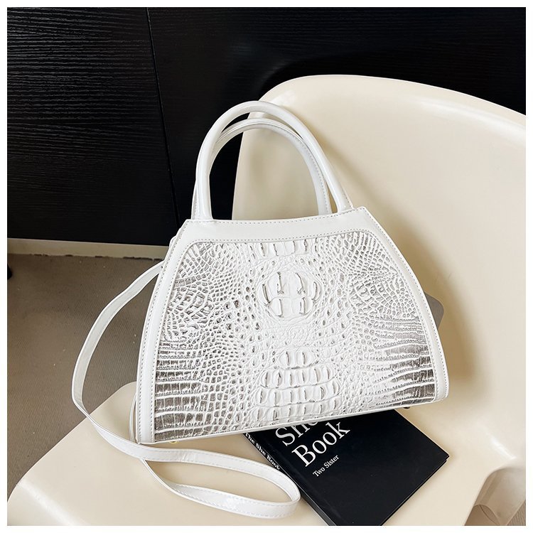 Comercio exterior al por mayor 2023 nuevo estilo retro tendencia bolso de mujer bolso de mensajero de un solo hombro de gran capacidad bolso de color a juego