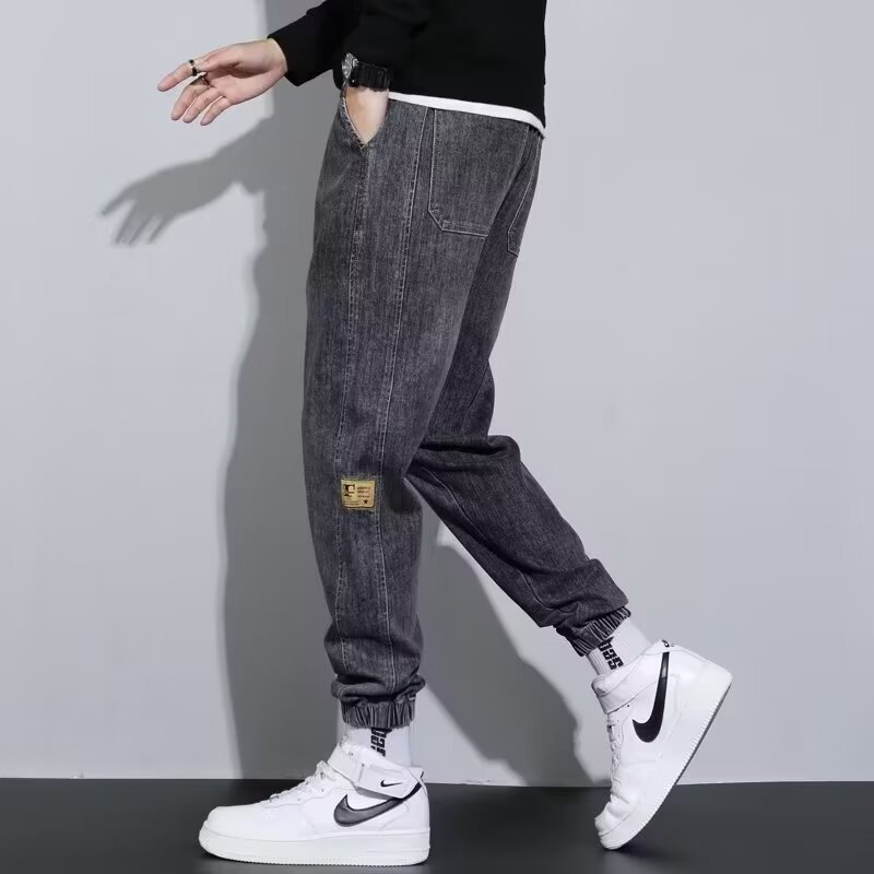 2024 primavera y otoño pantalones vaqueros de cintura elástica todo fósforo para hombres, pantalones de pierna ancha rectos sueltos para adolescentes de la calle principal