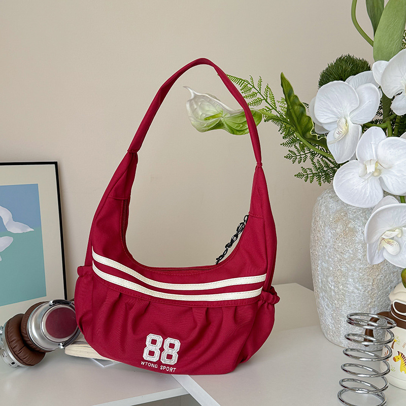 Versión coreana del bolso de hombro para niños y niñas de moda, bolso de mensajero para niños de gran capacidad digital de estilo occidental, bolso de niños a rayas de moda