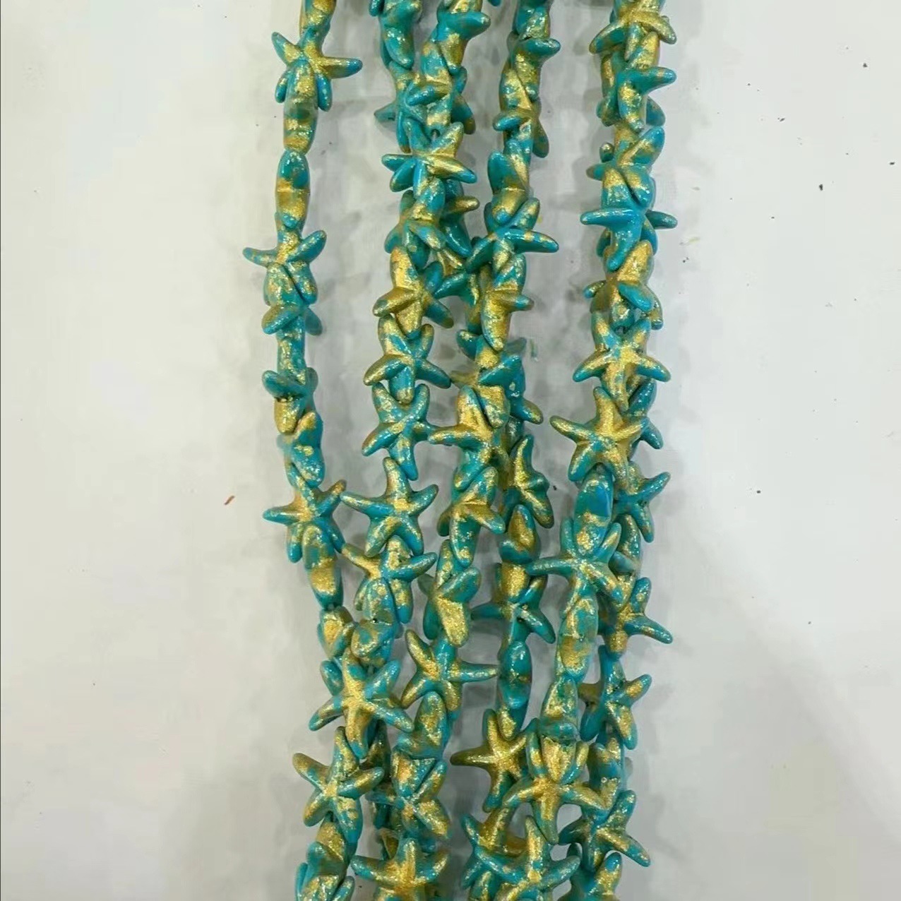 Ventas transfronterizas de coloridas estrellas de mar de piedra de pino cuentas semiacabadas DIY accesorios accesorios materiales de joyería hecha a mano