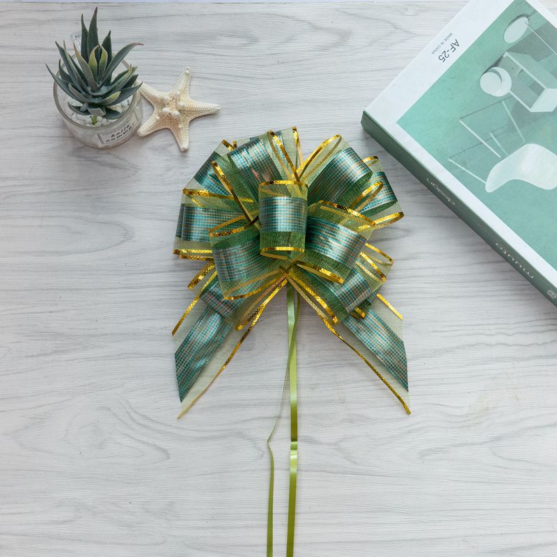 Fábrica directa 50 nuevo hilo de nieve corteza estriado flor de Navidad embalaje de regalos de Hong Kong mano flor perezosa nudo