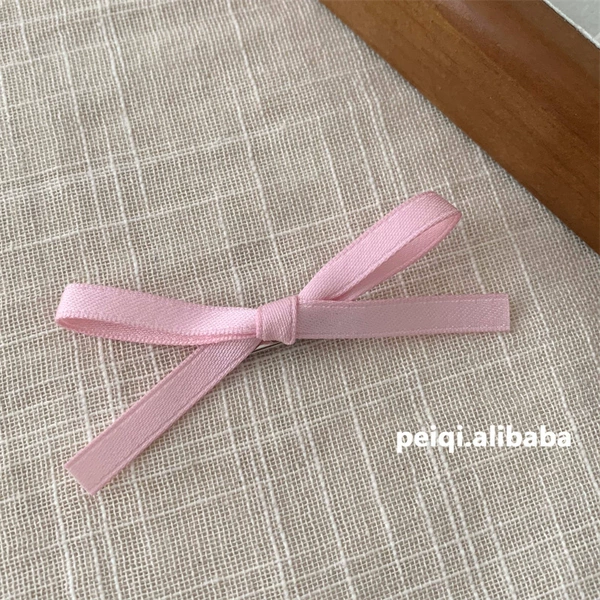 Fuchsia hair band with bow, hairgrip