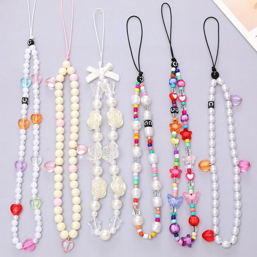 Hot selling Internet celebrity beaded love mobile phone chain anti-lost and anti-fall mobile phone case diy pearl hanging chain short mobile phone lanyard