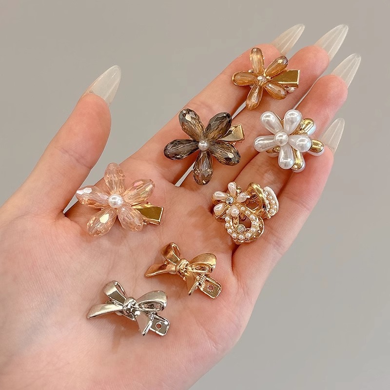 甘いクールな蝶結びの金属の小さいサイズのヘアピンの女性のサイドクリップの額の無痕の前髪の砕毛クリップの髪飾り|undefined