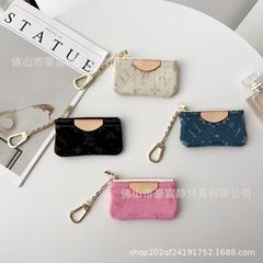 新商品の皮質の小銭入れのカードの包みのペンダントの軽豪華な対外貿易の金の大衆の欧米風のカードのカバンのカードカバーカップルの金