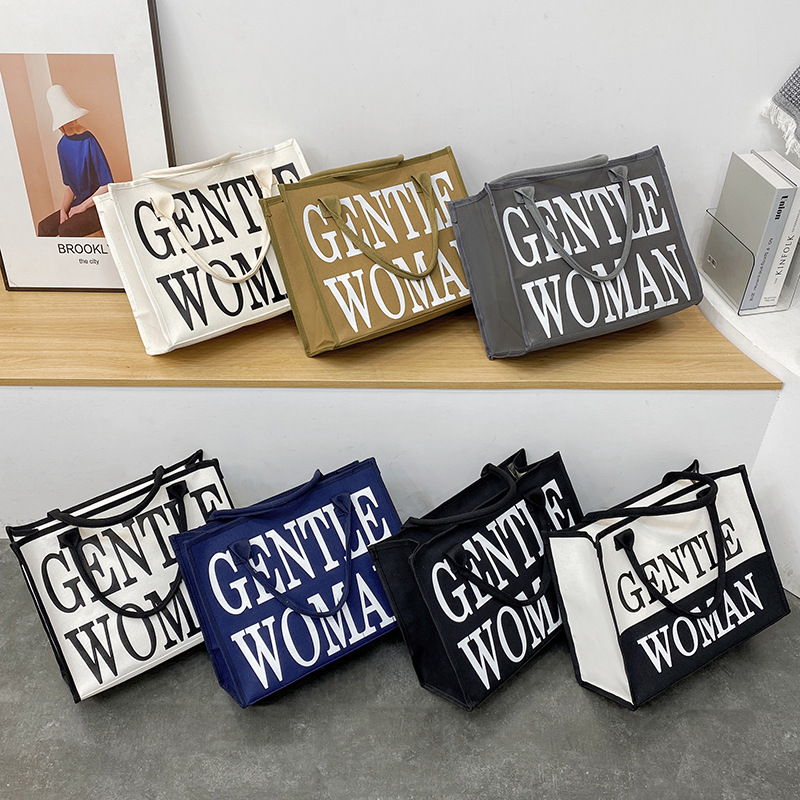 Letras coreanas de color ocio de estilo extranjero 2024 nueva bolsa de lona de hombro de gran capacidad de literatura y arte, bolsa de viento perezosa