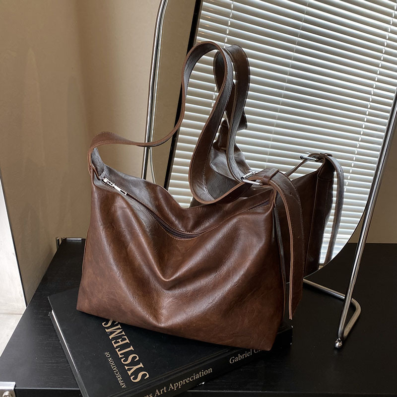 Bolso de gran capacidad relajado retro primavera 2025 nueva moda mochila de hombro textural bolso de dumpling damas