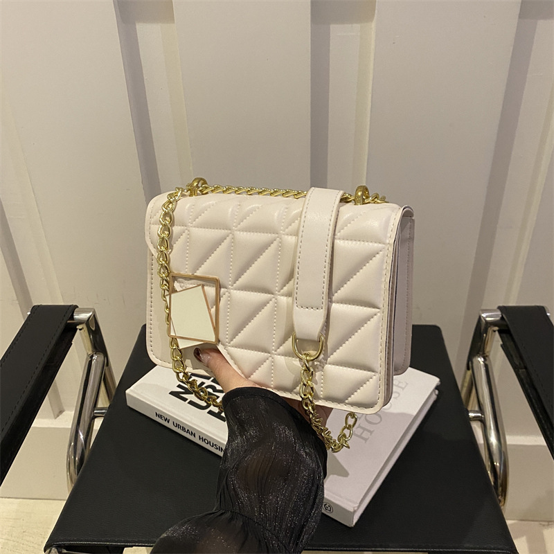 Damas bordadas de diamante moda 2024 otoño y invierno nuevo bolso de hombro mochila textura bolso de mano popular este año