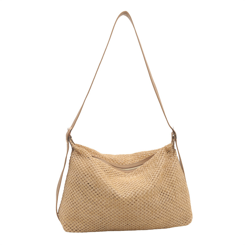 Nicho de alta sensación de bolso de tejido para mujeres 2024 nuevo tipo de viaje al trabajo bolso de paja de hombro de gran capacidad bolso de mochila