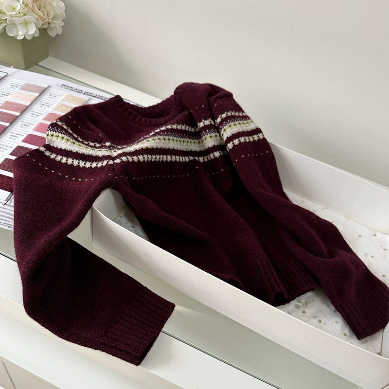 Woolen children's demi-season Christmas knitted sweater with a round collar