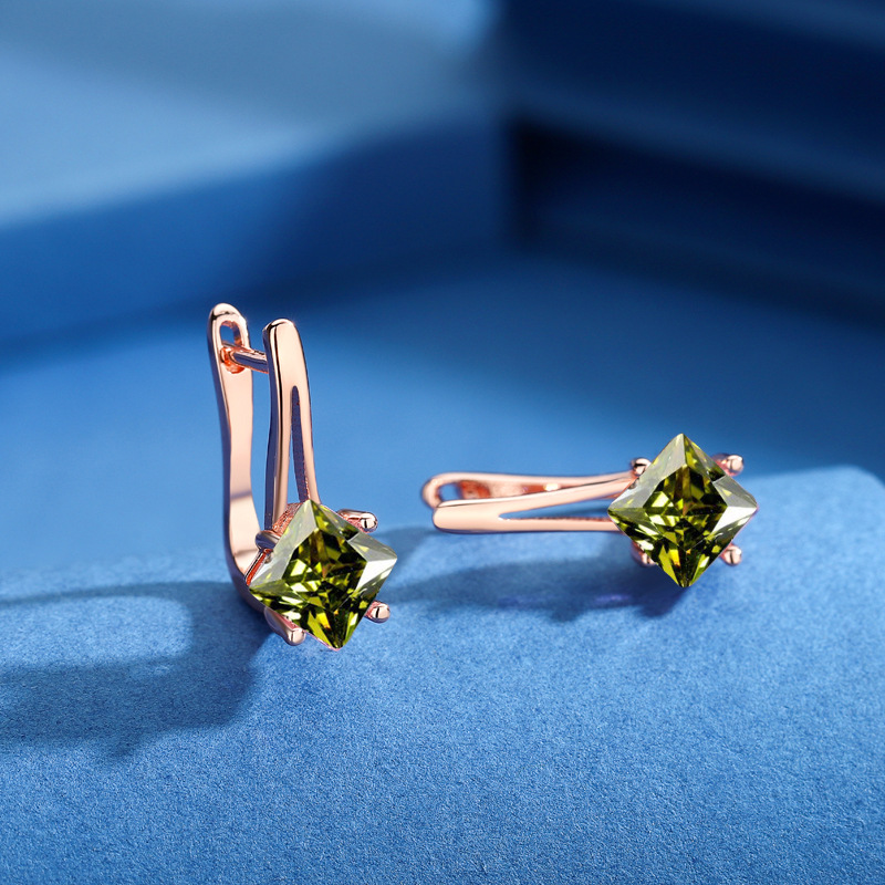 golden earrings with zircon