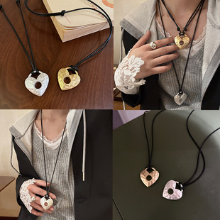 European and American Cross-border Black Drawable Oil Wax Rope Hollow Frosted Matte Love Pendant Necklace Female Niche Long Necklace