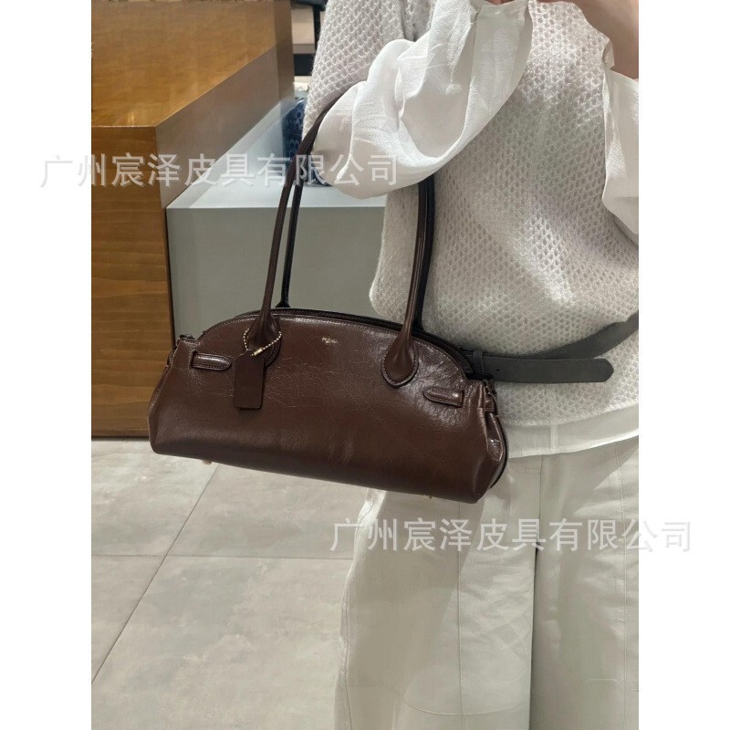 Coach 2025 New Empare Carryall Handbag Shoulder Commuter Fashion Retro Bowling Bag for Women