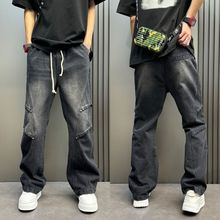 秋冬铆钉新款男士牛仔裤做旧长裤纯色拖地直筒裤松紧腰痞帅哈伦裤