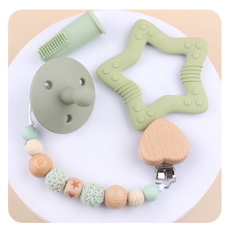 Nuevo bebé dibujos animados penta-planta de hayaja goma de bambú arco correa de cabello calmante tetina cadena set de cinco piezas