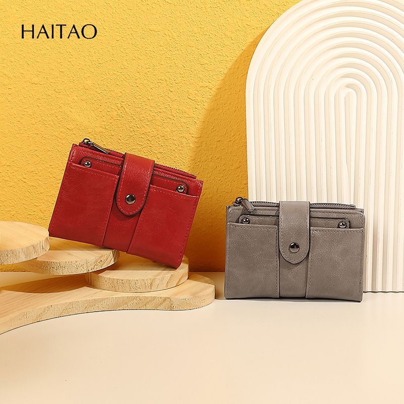 2025 nueva billetera retro de alta gama monedero de cuero dos veces corto con múltiples tarjetas, billetera de mujer