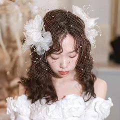 Handcrafted, exquisitely crafted, vibrant white tulle bridal headpiece with a dreamy, ethereal charm—perfect for romantic wedding dresses, formal gowns, and stunning makeup looks.