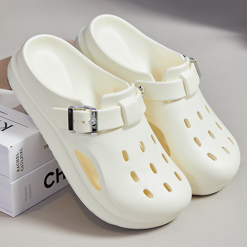 Pantuflas nuevas mujeres verano eva zapatos con agujeros para el cabello femenino moda exterior ropa plana comercio exterior ligero sandalias y pantuflas Baotou