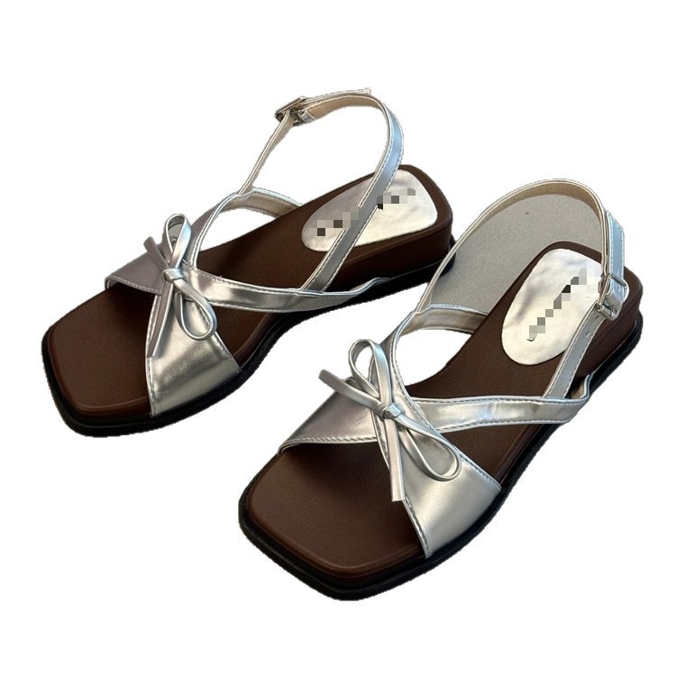 Hermosas sandalias para mujeres 2026 verano nuevo arco pendiente talón grueso no se cansará de los pies traseros sandálias de playa