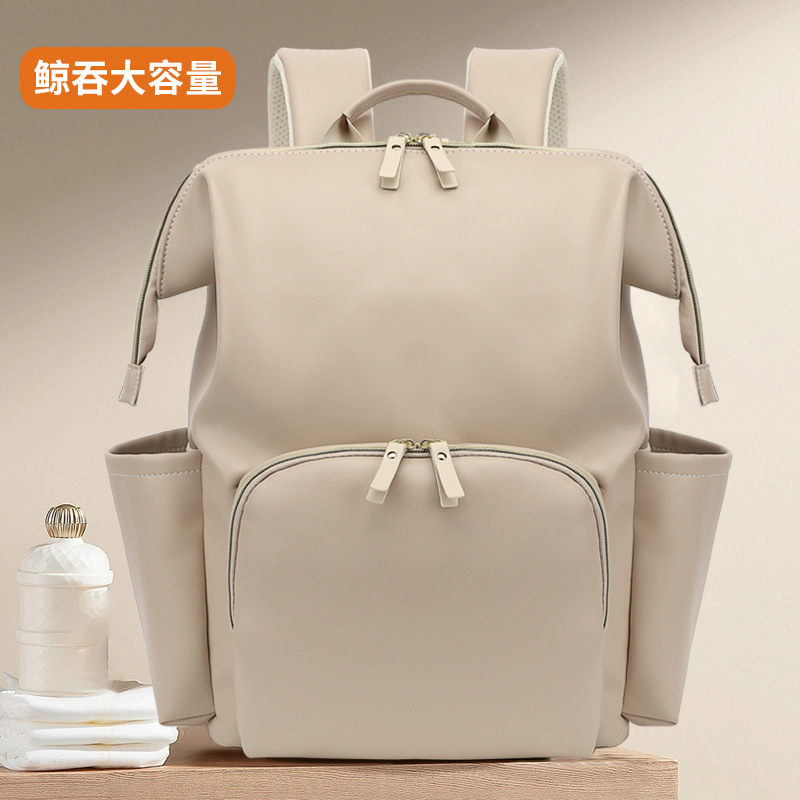 安心狐多機能マミーバッグ大容量ファッション外出母子バッグ宝母が人形を持って出かけるバックパック